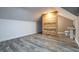 Half bathroom with wood accent wall and pedestal sink at 1150 Brushy Mountain Rd, Rockmart, GA 30153