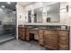 Modern bathroom with double vanity, large mirrors, and a walk-in shower at 1150 Brushy Mountain Rd, Rockmart, GA 30153