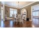 Formal dining room with hardwood floors and a large hutch at 1150 Brushy Mountain Rd, Rockmart, GA 30153