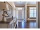 Bright entryway with hardwood floors and elegant console table at 1150 Brushy Mountain Rd, Rockmart, GA 30153