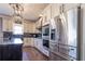 Modern kitchen with stainless steel appliances and hardwood floors at 1150 Brushy Mountain Rd, Rockmart, GA 30153