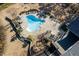 Aerial view of freeform pool and large deck at 1150 Brushy Mountain Rd, Rockmart, GA 30153