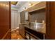 Bathroom with stainless steel vanity and tile floor at 1605 Brandon Hall Dr, Atlanta, GA 30350