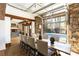 Dining room with sliding glass doors opening to a pool at 1605 Brandon Hall Dr, Atlanta, GA 30350