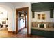 Charming entryway includes a built-in bench with storage and a coat rack at 1605 Brandon Hall Dr, Atlanta, GA 30350