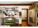 Modern kitchen features stainless steel appliances and custom green cabinetry at 1605 Brandon Hall Dr, Atlanta, GA 30350