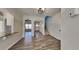 Inviting entryway with hardwood floors and staircase to upper level at 2548 Bellview Nw Ave, Atlanta, GA 30318