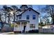 Charming two-story house with a front porch and landscaped lawn at 2548 Bellview Nw Ave, Atlanta, GA 30318