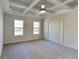 Spacious main bedroom with carpet flooring and walk-in closet at 2548 Bellview Nw Ave, Atlanta, GA 30318