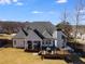 Aerial view showcasing house and backyard deck at 5008 Cambridge Ln, Villa Rica, GA 30180