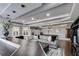 Basement bar area with seating and a view into the recreation area at 5008 Cambridge Ln, Villa Rica, GA 30180