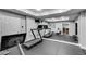 Basement gym with treadmills, rowing machine, and large mirror at 5008 Cambridge Ln, Villa Rica, GA 30180