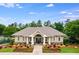 Community clubhouse with landscaping and walkway at 5008 Cambridge Ln, Villa Rica, GA 30180