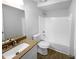 Clean bathroom with granite vanity top and updated fixtures at 2190 Wellington Cir, Lithonia, GA 30058