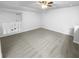 Spacious bonus room with carpet, ceiling fan and skylights at 2190 Wellington Cir, Lithonia, GA 30058