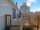 Spacious deck with wooden railings, offering scenic backyard views at 2190 Wellington Cir, Lithonia, GA 30058