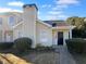Inviting exterior of charming house, featuring a well-maintained lawn and walkway at 2190 Wellington Cir, Lithonia, GA 30058