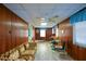 Spacious finished basement with a couch and table at 750 Skipper Dr, Atlanta, GA 30318