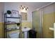Bright bathroom with yellow tiled walls and a walk-in shower at 750 Skipper Dr, Atlanta, GA 30318