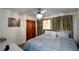 Spacious bedroom with king-size bed and ceiling fan at 750 Skipper Dr, Atlanta, GA 30318