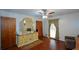 Bedroom with hardwood floors, dresser, and ceiling fan at 750 Skipper Dr, Atlanta, GA 30318