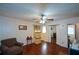 Bright bedroom with hardwood floors and mirrored closet doors at 750 Skipper Dr, Atlanta, GA 30318