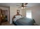 Bedroom with a queen bed and ceiling fan at 750 Skipper Dr, Atlanta, GA 30318