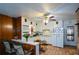 Efficient kitchen featuring white cabinets, tile floors, and a convenient breakfast bar at 750 Skipper Dr, Atlanta, GA 30318