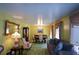 Living and dining area with plush furniture and carpeting at 750 Skipper Dr, Atlanta, GA 30318