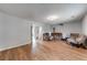 Spacious basement, complete with hardwood floors and furniture, ready for customization at 2205 Castle Royale Dr, Lawrenceville, GA 30043