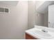 Small bathroom with single sink vanity and shower at 1177 Arlington Ave, Atlanta, GA 30310