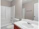 Bathroom features a shower/tub combo and wood vanity at 1177 Arlington Ave, Atlanta, GA 30310