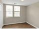 Simple bedroom with wood floors and neutral walls at 1177 Arlington Ave, Atlanta, GA 30310