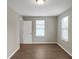 Well-lit bedroom with wood floors and neutral wall colors at 1177 Arlington Ave, Atlanta, GA 30310