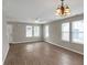 Bright living room with hardwood floors and neutral walls at 1177 Arlington Ave, Atlanta, GA 30310