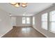 Bright living room with hardwood floors and neutral walls at 1177 Arlington Ave, Atlanta, GA 30310