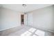 Bright bedroom with carpet flooring and ample natural light at 1216 Foxcroft Ln, Cumming, GA 30041