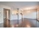 Open concept dining room with hardwood floors and kitchen views at 1216 Foxcroft Ln, Cumming, GA 30041