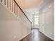 Modern carpeted staircase with metal railing at 1216 Foxcroft Ln, Cumming, GA 30041