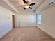 Well-lit bedroom, ceiling fan, and carpeted floor at 1814 Emory Ln # 92, Conyers, GA 30013