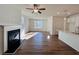 Sunlit living room with hardwood floors and fireplace at 1814 Emory Ln # 92, Conyers, GA 30013