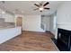 Spacious living room with hardwood floors, fireplace and kitchen island at 1814 Emory Ln # 92, Conyers, GA 30013