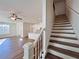 Modern staircase with dark wood and metal railing at 1814 Emory Ln # 92, Conyers, GA 30013