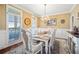 Elegant dining room featuring a large table, chandelier, and hardwood floors at 37 Waterstone Se Dr, Cartersville, GA 30121