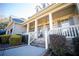 Front porch with stone steps and white columns at 37 Waterstone Se Dr, Cartersville, GA 30121