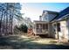 Exterior view of the house, highlighting the screened porch and yard at 37 Waterstone Se Dr, Cartersville, GA 30121