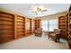 Spacious library featuring built-in bookshelves and comfortable seating at 37 Waterstone Se Dr, Cartersville, GA 30121