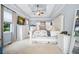 Main bedroom with high ceilings and sliding barn door to bathroom at 37 Waterstone Se Dr, Cartersville, GA 30121