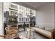Comfortable balcony with lounge seating, a small table, and a view of the building's exterior at 396 Pratt Se Dr # 1932, Atlanta, GA 30315
