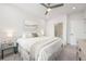 Bright bedroom featuring a king-sized bed, neutral decor, and recessed lighting, creating a serene atmosphere at 396 Pratt Se Dr # 1932, Atlanta, GA 30315
